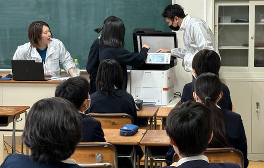 Students learning the history of the copying machine in class